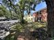 Building exterior with parking and landscaping at 13824 Orange Sunset Dr # 202, Tampa, FL 33618