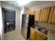 Efficient kitchen with stainless steel appliances and ample cabinetry at 13824 Orange Sunset Dr # 202, Tampa, FL 33618