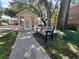 Community mailbox area with bench at 13824 Orange Sunset Dr # 202, Tampa, FL 33618
