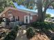 Community building exterior with landscaping at 13824 Orange Sunset Dr # 202, Tampa, FL 33618