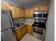 Updated kitchen with stainless steel appliances at 13824 Orange Sunset Dr # 202, Tampa, FL 33618