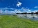 Scenic view of lake and lush greenery at 13824 Orange Sunset Dr # 202, Tampa, FL 33618