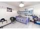 Bedroom with a twin-over-full bunk bed and dresser at 4222 Trucious Pl # 4222, New Port Richey, FL 34652