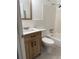 Updated bathroom with modern vanity, white subway tile shower, and new fixtures at 2070 World Parkway Blvd # 50, Clearwater, FL 33763