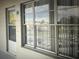 Exterior view of a condo building with a door and windows at 2070 World Parkway Blvd # 50, Clearwater, FL 33763