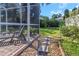 Landscaped backyard with stone pathway and pool at 2228 Valrico Forest Dr, Valrico, FL 33594