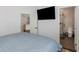 Serene bedroom with ensuite bathroom and kitchen access at 2228 Valrico Forest Dr, Valrico, FL 33594