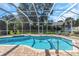 Sparkling pool with screened enclosure and spacious patio at 2228 Valrico Forest Dr, Valrico, FL 33594