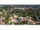 Wide aerial view showing home's location in a quiet residential neighborhood at 2228 Valrico Forest Dr, Valrico, FL 33594