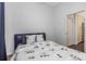 Cozy bedroom with a full-size bed and adjacent closet at 2228 Valrico Forest Dr, Valrico, FL 33594