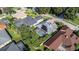Aerial view of home with pool and large backyard, located on a quiet street at 2228 Valrico Forest Dr, Valrico, FL 33594