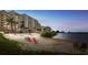 Private beach access with colorful chairs at 6009 Sea Ranch Dr # 301, Hudson, FL 34667