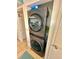 Stackable LG washer and dryer in laundry closet at 6009 Sea Ranch Dr # 301, Hudson, FL 34667