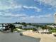 Stunning view of the bay, pool, and surrounding landscape at 6009 Sea Ranch Dr # 301, Hudson, FL 34667