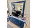 Bedroom with dresser and coastal decor at 6009 Sea Ranch Dr # 301, Hudson, FL 34667