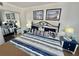 Main bedroom with king-size bed and coastal decor at 6009 Sea Ranch Dr # 301, Hudson, FL 34667