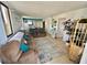 Bright living room featuring comfortable seating and coastal decor at 6009 Sea Ranch Dr # 301, Hudson, FL 34667