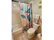 Bathroom with shower/tub combo, and coastal decor at 6009 Sea Ranch Dr # 301, Hudson, FL 34667