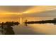 Bright sunset reflecting on the calm water at 6009 Sea Ranch Dr # 214, Hudson, FL 34667