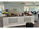 Community bar with seating area and refreshments at 6009 Sea Ranch Dr # 214, Hudson, FL 34667