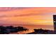 Stunning sunset over calm waters and houses at 6009 Sea Ranch Dr # 214, Hudson, FL 34667