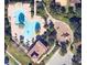 Community pool, playground, and parking lot are featured in this aerial view at 1005 Sonesta Ave, Brandon, FL 33511