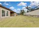 Large backyard with grassy lawn and a privacy fence at 1005 Sonesta Ave, Brandon, FL 33511