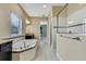 Bathroom with garden tub, double sinks, and a separate shower at 1005 Sonesta Ave, Brandon, FL 33511