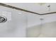 Clean bathroom with walk-in shower, neutral tile, and built-in shelf at 1005 Sonesta Ave, Brandon, FL 33511