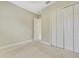 Bedroom with double door closet and carpet flooring at 1005 Sonesta Ave, Brandon, FL 33511