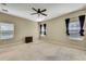 Bright and airy bedroom with carpeted floor and ceiling fan at 1005 Sonesta Ave, Brandon, FL 33511