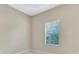 Small bedroom with window and blinds at 1005 Sonesta Ave, Brandon, FL 33511