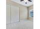 Spacious bedroom with neutral walls, carpeting, and a large closet at 1005 Sonesta Ave, Brandon, FL 33511