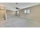 Spacious bonus room with ceiling fan and carpeted floors at 1005 Sonesta Ave, Brandon, FL 33511