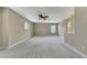 Bonus room with neutral walls, ceiling fan, and carpet at 1005 Sonesta Ave, Brandon, FL 33511