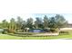 La Collina community entrance with stonework and landscaping at 1005 Sonesta Ave, Brandon, FL 33511