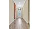 Bright entryway with tile flooring and elegant light fixture at 1005 Sonesta Ave, Brandon, FL 33511