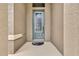 Gray front door with glass panels and a patterned doormat at 1005 Sonesta Ave, Brandon, FL 33511