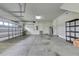 Two car garage with storage shelving and additional door at 1005 Sonesta Ave, Brandon, FL 33511