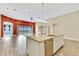 Open kitchen island with granite countertop and stainless steel appliances at 1005 Sonesta Ave, Brandon, FL 33511