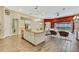 Open kitchen boasts granite countertops, stainless steel appliances, and an island at 1005 Sonesta Ave, Brandon, FL 33511