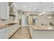 Large kitchen island with granite countertops and stainless steel appliances at 1005 Sonesta Ave, Brandon, FL 33511