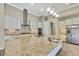 Spacious kitchen with granite countertops, stainless steel appliances, and an island at 1005 Sonesta Ave, Brandon, FL 33511