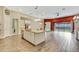 Open kitchen with island, stainless steel appliances, and granite countertops at 1005 Sonesta Ave, Brandon, FL 33511