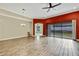 Open living room with hardwood floors and a view to the backyard at 1005 Sonesta Ave, Brandon, FL 33511