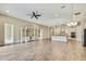 Open concept living room and kitchen with hardwood floors at 1005 Sonesta Ave, Brandon, FL 33511