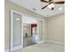 Office with French doors opening to the living area at 1005 Sonesta Ave, Brandon, FL 33511