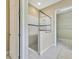 Large walk-in shower with glass enclosure and tiled walls at 1005 Sonesta Ave, Brandon, FL 33511