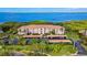 Waterfront condo building with covered parking and lush landscaping at 2725 Terra Ceia Bay Blvd # 201, Palmetto, FL 34221