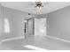 Second bedroom with tile floors and access to bathroom at 2725 Terra Ceia Bay Blvd # 201, Palmetto, FL 34221